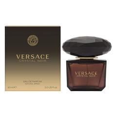 Versace Crystal Noir bottle close-up highlighting elegant design for evening wear