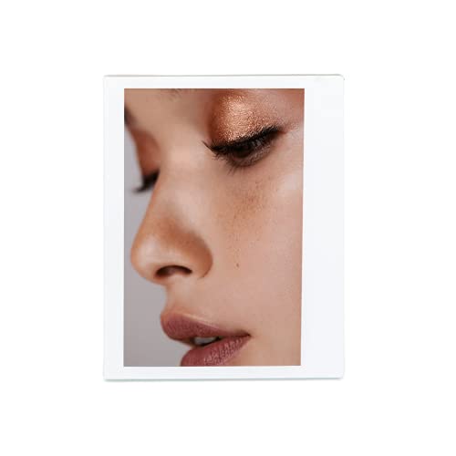 Victoria Beckham Beauty Lid Lustre Honey close-up swatch shows wet pearlescent glow.