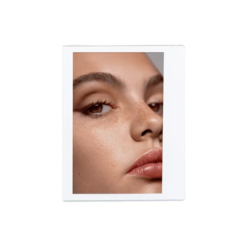 Victoria Beckham Posh Lipstick Spice durability tested on lips for long wear.