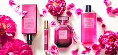 Victoria's Secret Bombshell Passion Mist application shot highlighting its timeless floral notes.