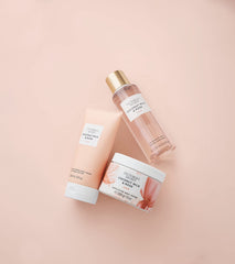 Victoria's Secret Coconut Milk and Rose Scrub open jar inviting calm fragrance while cleansing