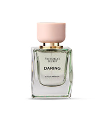 Victoria's Secret Daring bottle emphasizes oakmoss heart for earthy depth.