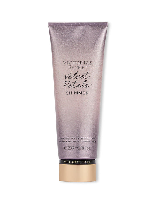 Victoria's Secret Velvet Petals Shimmer lotion bottle showing silky texture and glow.