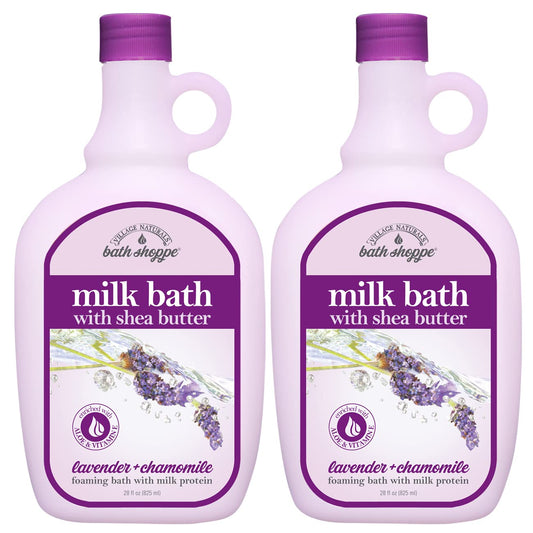 Village Naturals Bath Shoppe lavender chamomile milk bath bottles being poured for a soothing soak.