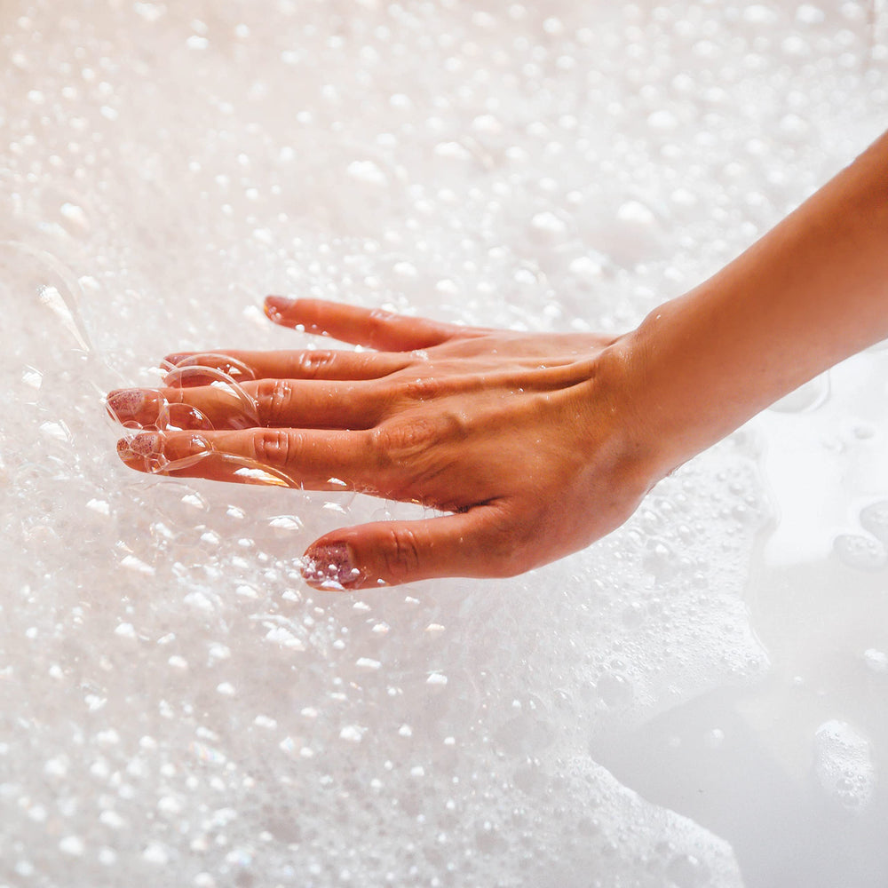 Village Naturals Bath Shoppe front packaging highlights USA-made, cruelty-free bath care.