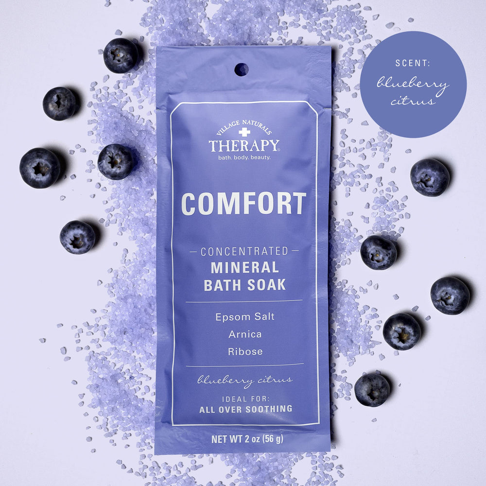 Village Naturals Therapy arnica blueberry ginger blend shown for a soothing infusion.