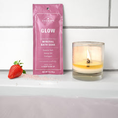Village Naturals Therapy Glow texture close-up conveys shimmering mineral bath salts.