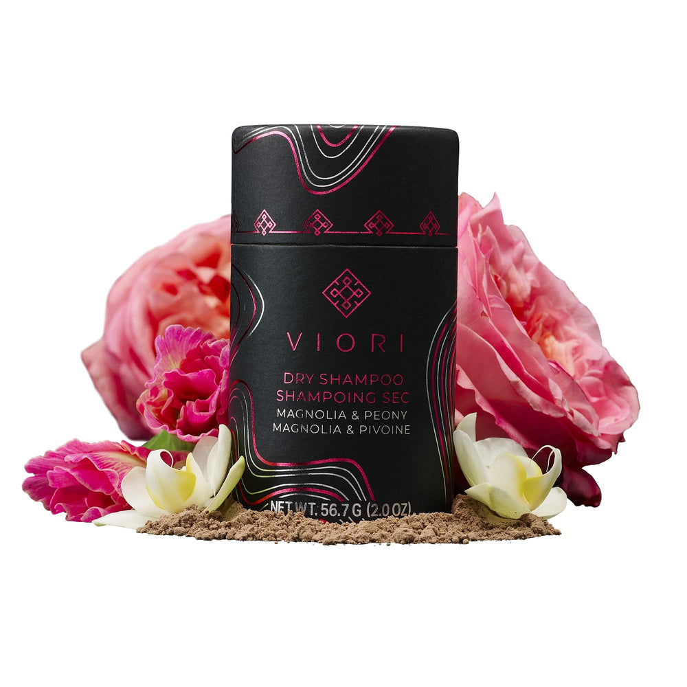 Viori dry shampoo powder magnolia peony bottle refreshes and absorbs oil for a quick boost.