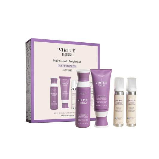 Virtue Flourish shampoo for thinning hair bottle on sink, gentle cleanse for healthier scalp.