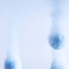 Vitabath Bath Fizzies Lavender Chamomile spa moment with towel and candle.