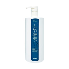 Vitabath Spa Skin Therapy hands lathering with gentle cleansing foam.