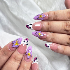 Vlazryk winter-gradient nails, rich purple tones, offer long-lasting at-home manicure.
