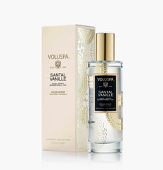 Voluspa Santal Vanille room mist applied to a surface adds a warm, woody fragrance.