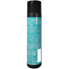 Watercolors teal bottle shown in a bathroom setup for home color refresh.