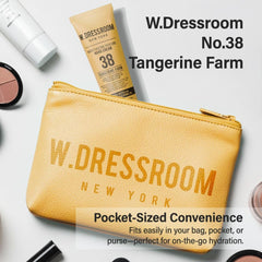 WDressroom Moisturizing Hand Cream in purse-ready setup for quick re-application.