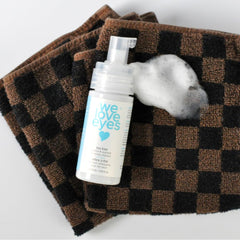We Love Eyes Tea Tree Cleanser foaming action shows rich lather for gentle eyelid cleansing.