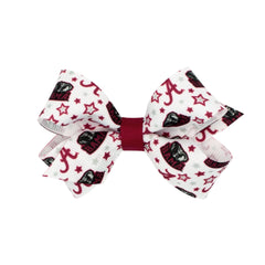 Wee Ones Divine Creations Alabama logo bow on Wee Stay clip for secure wear.