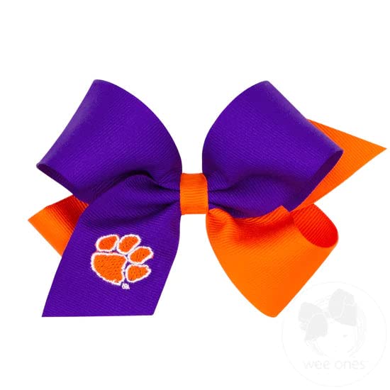 Wee Ones Divine Creations Clemson game-day bow on WeeStay clip for secure wear.