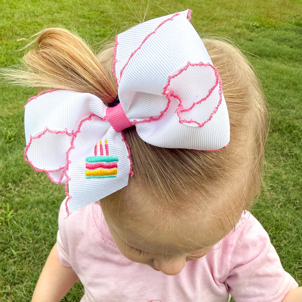 Wee Ones party bow ready for photos and gifting occasions.