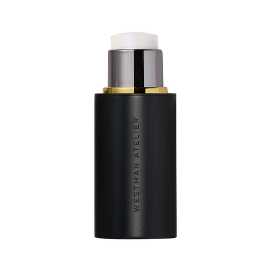 WESTMAN ATELIER Lit Up Highlighter Stick swatch showing radiant, natural glow