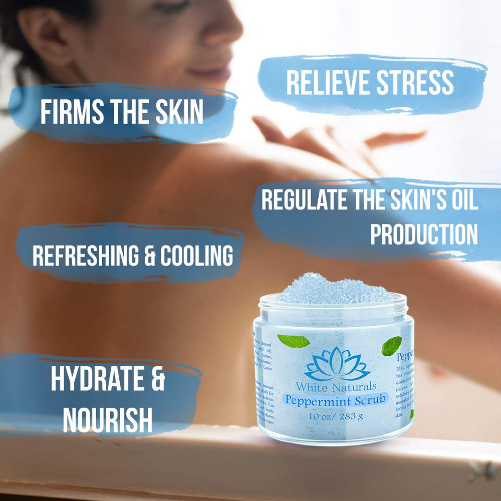 Hand applying White Naturals Peppermint Scrub in a circular massage motion.