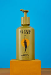 Wonder Valley Hinoki Body Wash maple-syrup texture demonstrating luxurious feel.