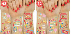 xo-fetti circus tattoos with gold and silver foil circus animals for lively party decor.