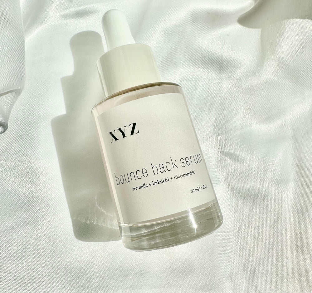 XYZ Skin Bounce Back Serum application drops on palm showing quick absorption
