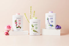 Yardley London English Rose talc powder with soft puff for gentle application.