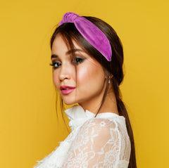 Model wearing YETASI velvet headband for day-to-night versatility.