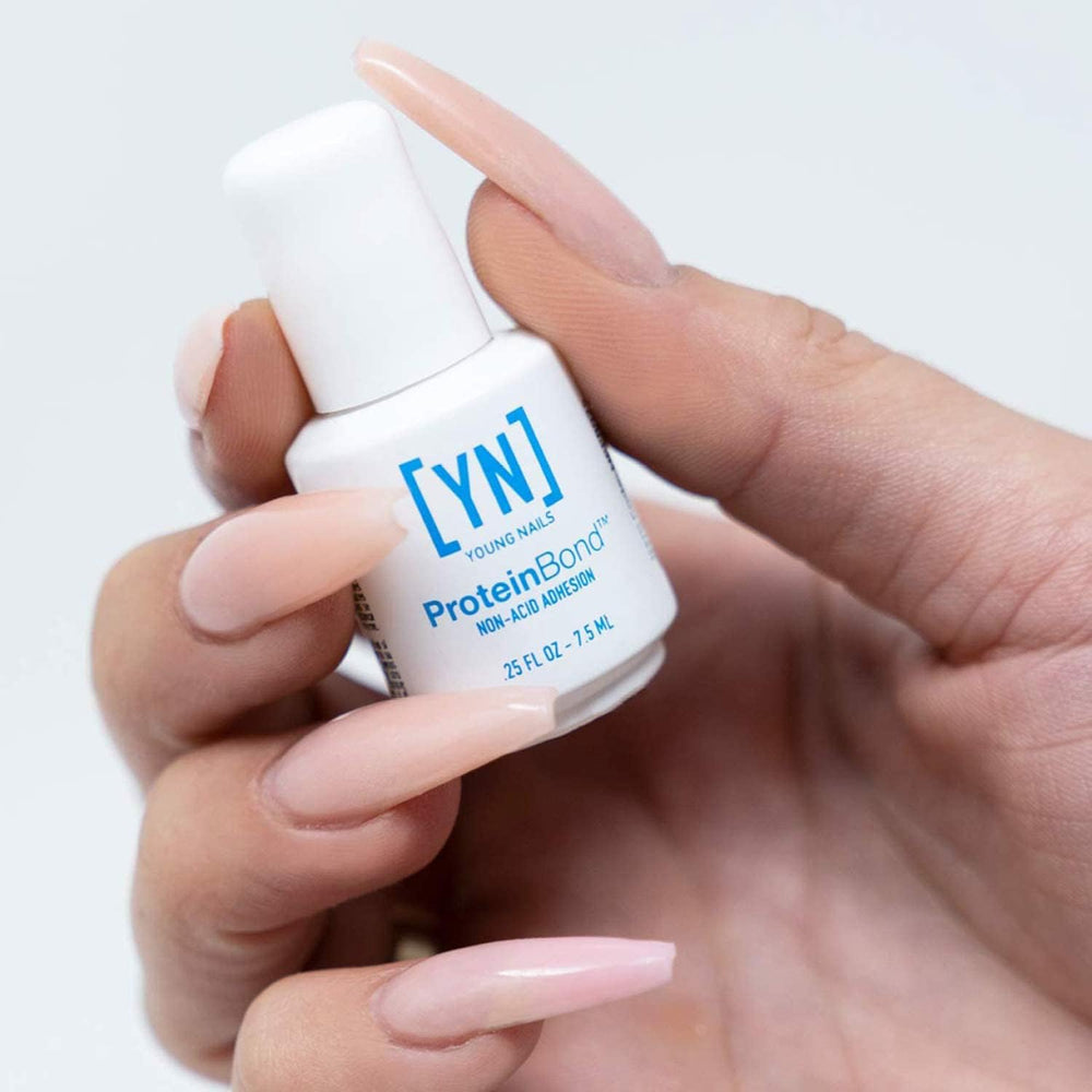 Young Nails Nail Protein Bond packaging highlights 0.25 oz precision primer for home use.