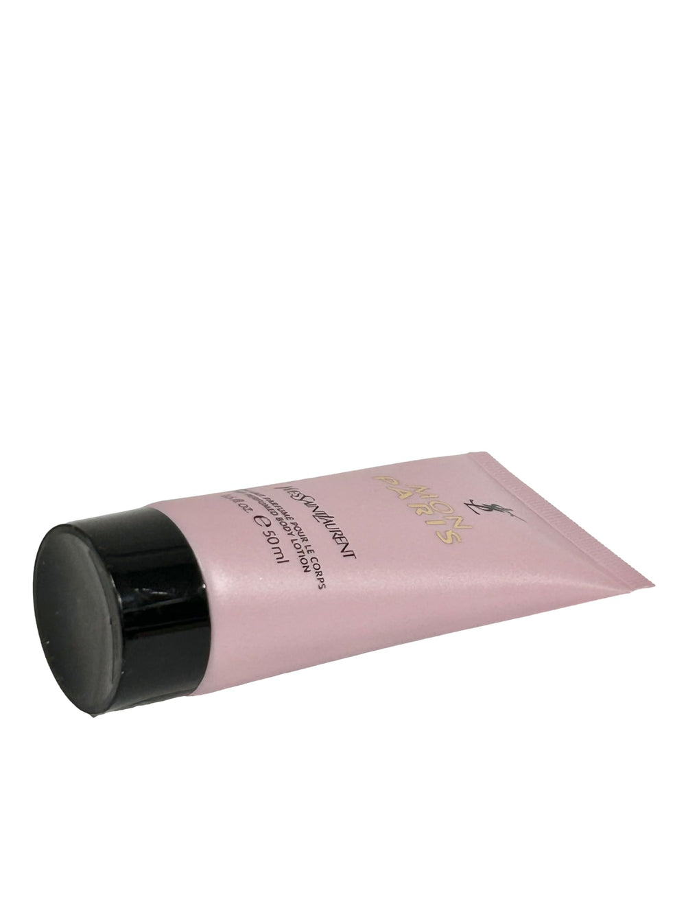 Compact travel-size YSL MON PARIS lotion packaging for on-the-go fragrance and moisture