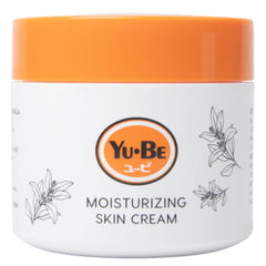 Yu-Be moisturizing skin cream jar close-up showing smooth texture for daily hand hydration.
