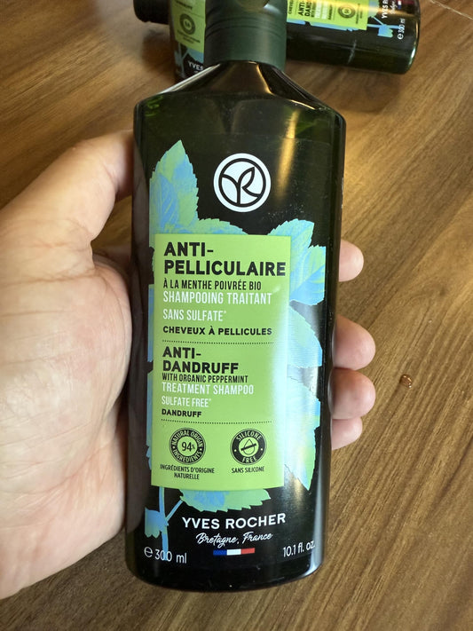 Yves Rocher anti-dandruff shampoo bottle front, silicone-free plant-based cleanser