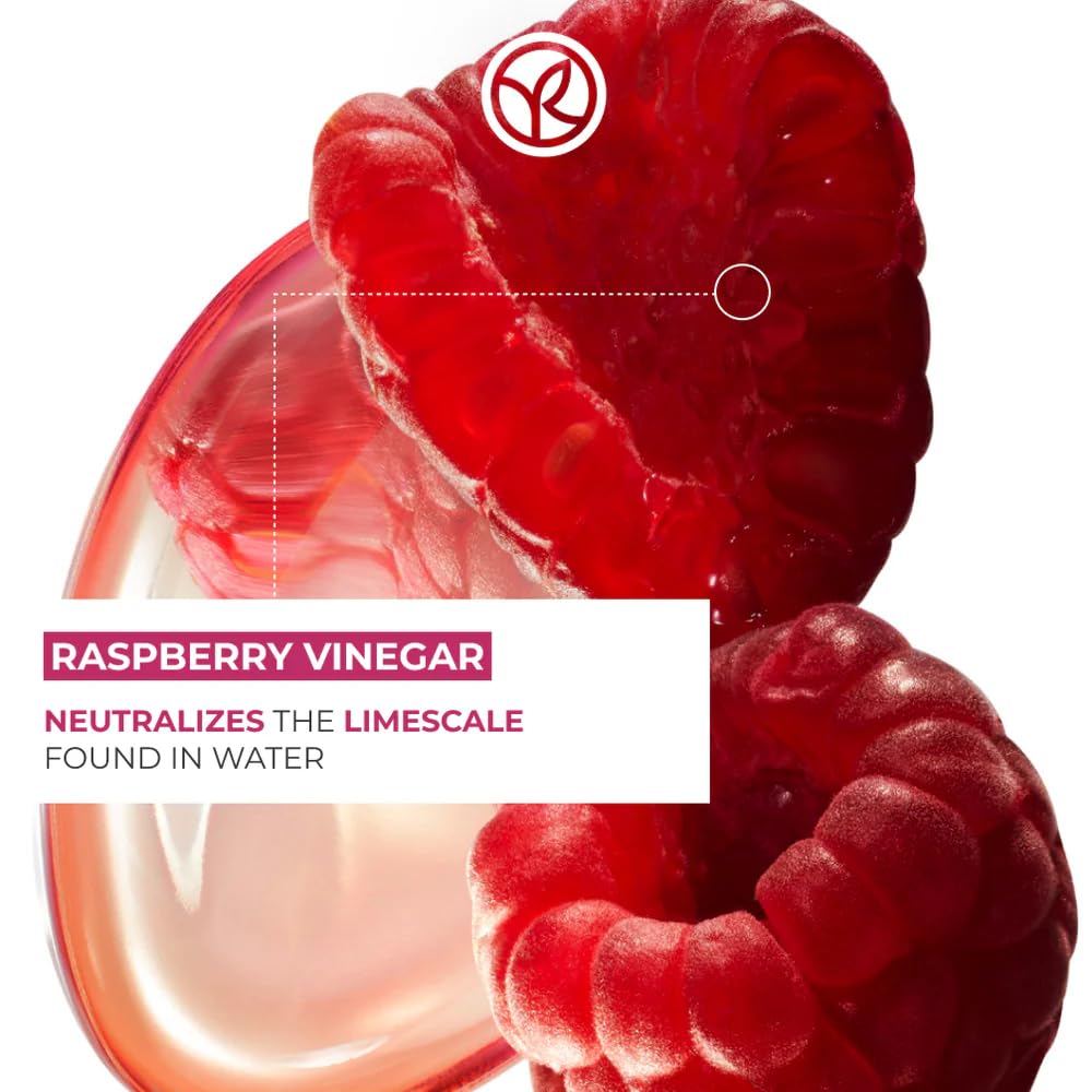 Yves Rocher Raspberry Vinegar Rinse being poured for post-wash use.