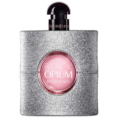 Yves Saint Laurent Black Opium Glitter bottle on display for chic evening glamour.