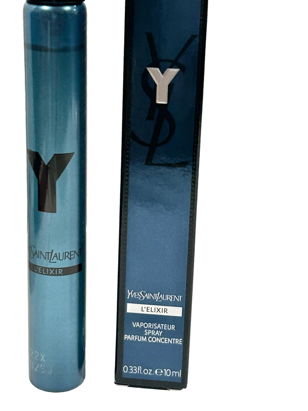 YSL Y ELIXIR MEN bottle close-up showing premium packaging