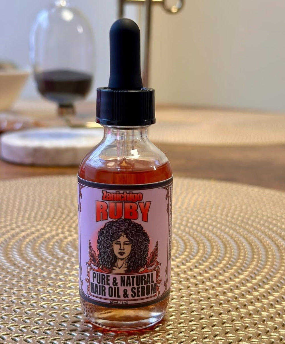 Zanichigo Ruby Hair Oil hibiscus flowers, hinting at shine and softness.
