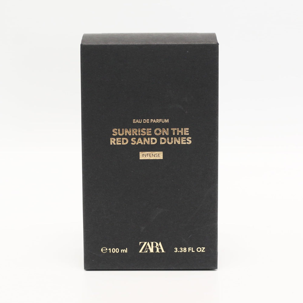 Zara Sunrise EDP packaging beside bottle, premium presentation.