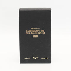 Zara Sunrise EDP packaging beside bottle, premium presentation.
