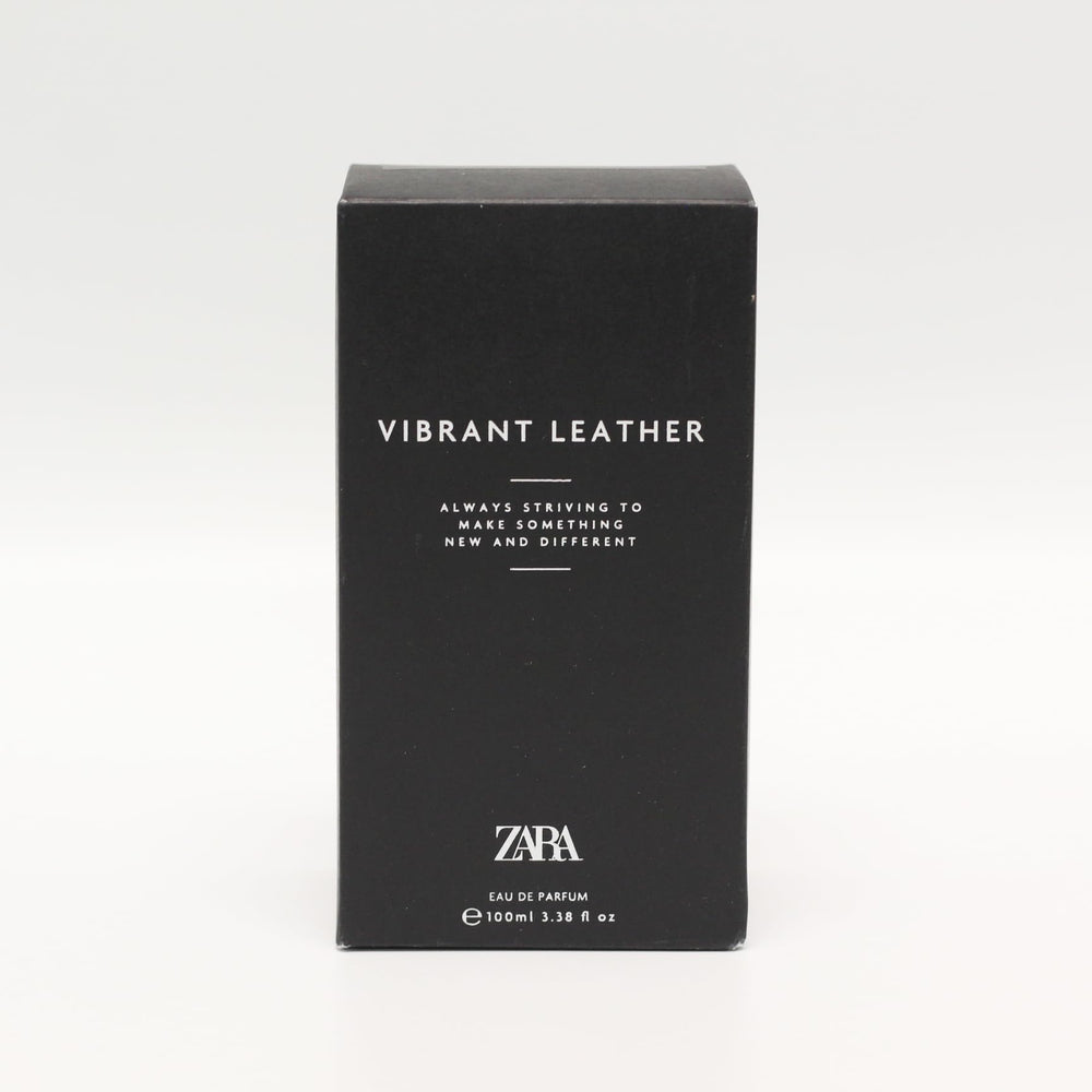 Zara Vibrant Leather bottle on dresser indicating versatile all-day fragrance for him