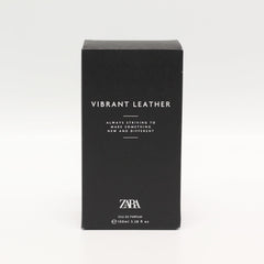 Zara Vibrant Leather bottle on dresser indicating versatile all-day fragrance for him