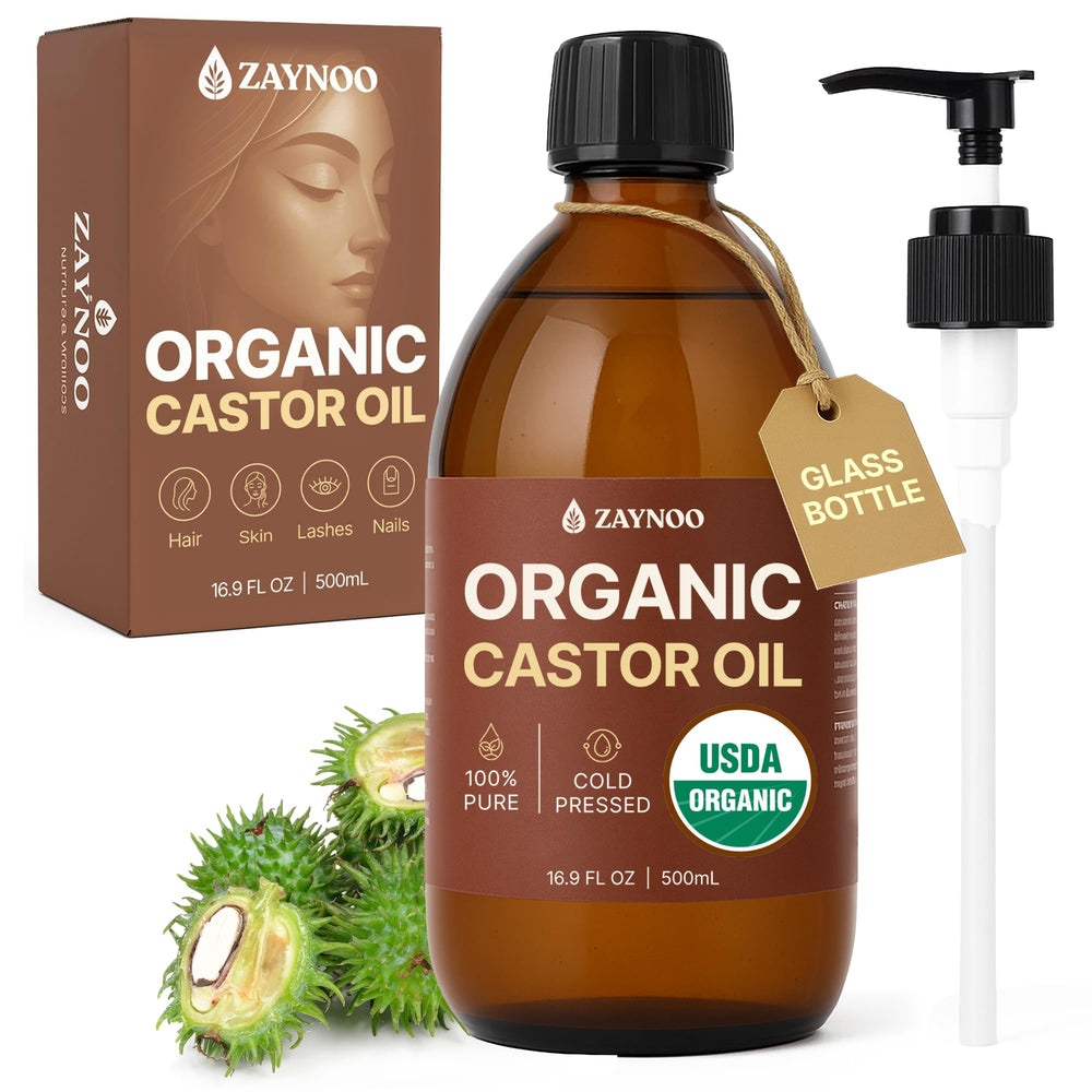 Zaynoo organic castor oil in amber bottle with pump for easy application.