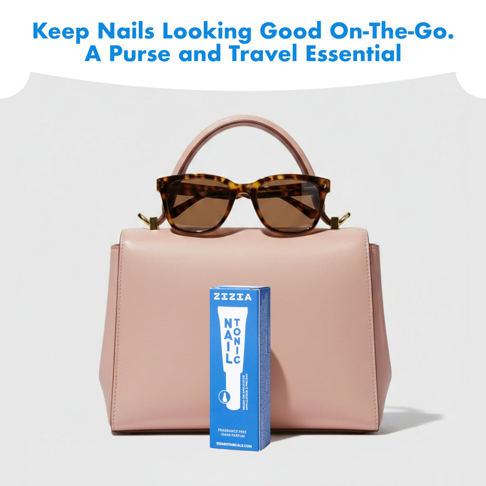 Applying Zizia Unscented Nail Tonic to nails and cuticles for hydration.