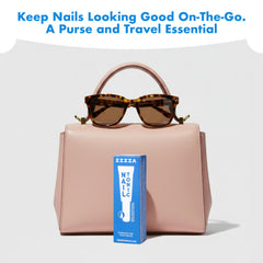 Applying Zizia Unscented Nail Tonic to nails and cuticles for hydration.