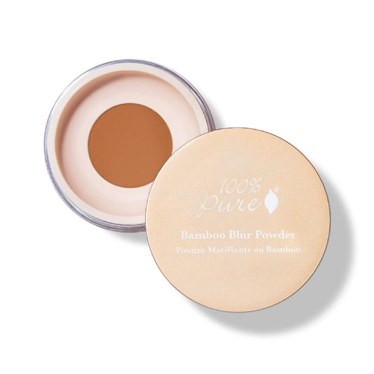 100% PURE Bamboo Blur Powder Tan swatch with warm undertones for a natural finish.