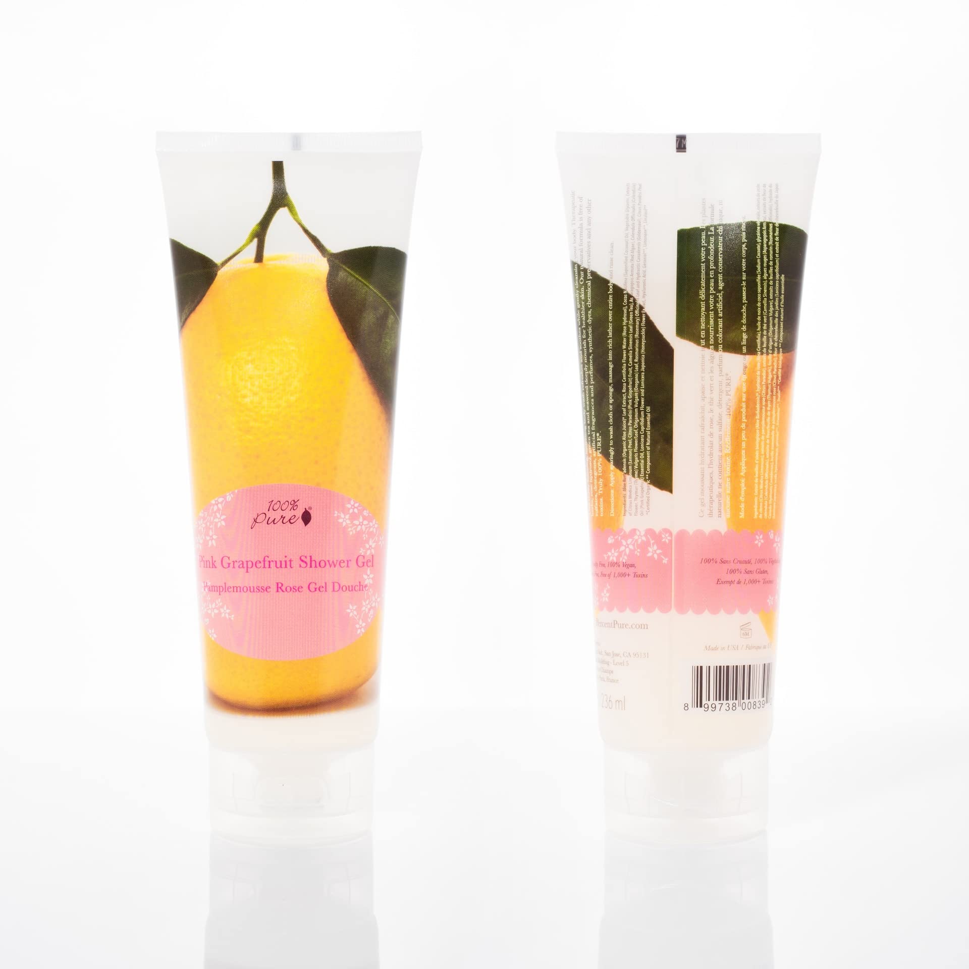 100% PURE Pink Grapefruit Shower Gel bottle pouring to show creamy lather.
