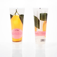 100% PURE Pink Grapefruit Shower Gel bottle pouring to show creamy lather.