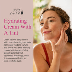 Swatch of 100% PURE White Peach tinted moisturizer showing light-to-medium shade.