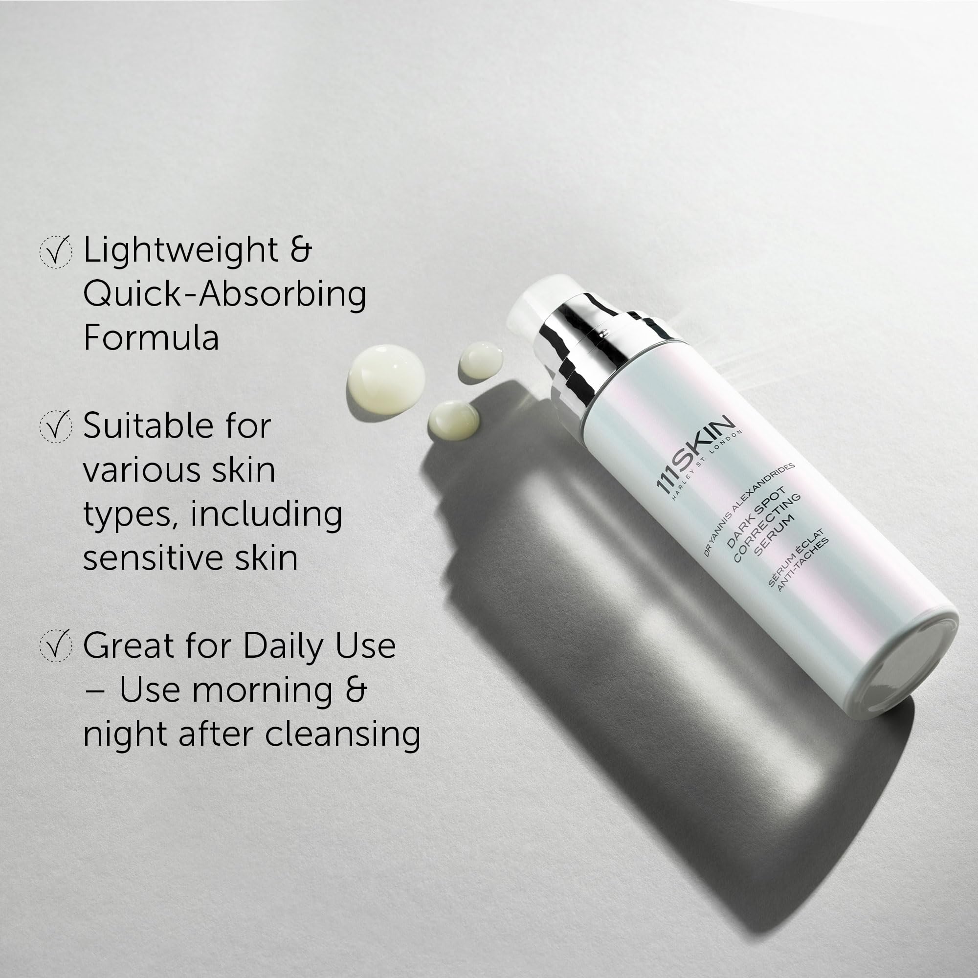 111SKIN dark spot serum applied on cheek for radiant-looking skin